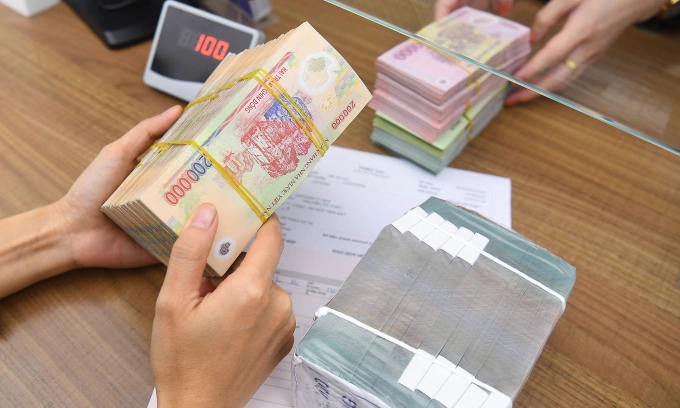 Doanh nghiệp cần vốn để mở rộng sản xuất kinh doanh. Ảnh minh họa: Giang Huy