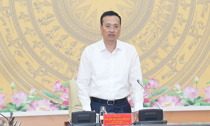 Phó thống đốc Phạm Quang Dũng tại cuộc họp với các tổ chức tín dụng và doanh nghiệp triển khai Nghị định 232 về kinh doanh vàng. Ảnh: VGP