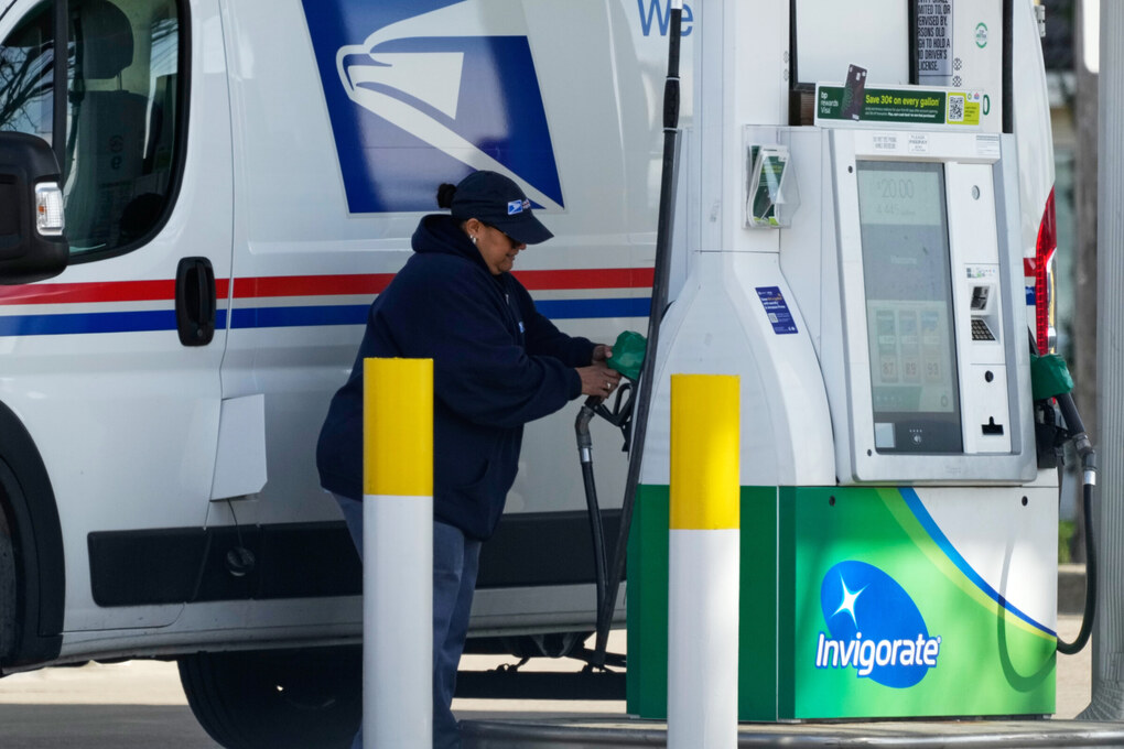 Delivery truck pump gas at Chicago station, April 7. Photo: AP