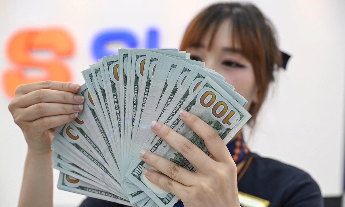 Giá USD ngân hàng giảm 5 ngày liên tiếp, tiền đồng tăng giá hơn 1% so với đầu năm